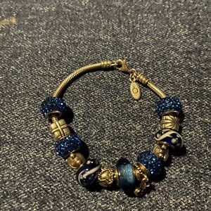 EUC Authentic Pandora Bracelet with 13 charms.